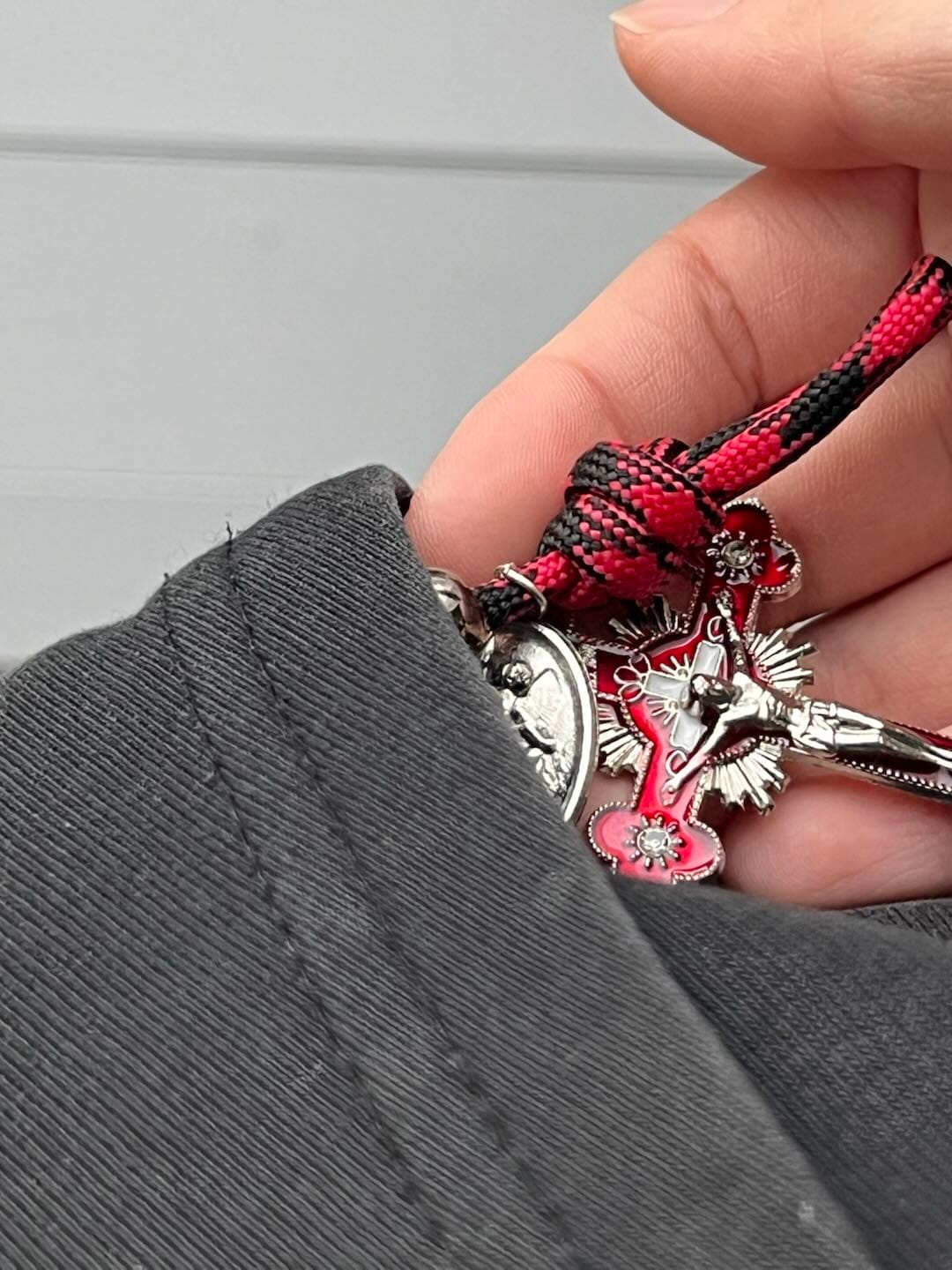 Customer photo review of Solacebeads Gunmetal Bead Car Rosary & Red Enamel Crucifix: Rooted In St. Michael Protection