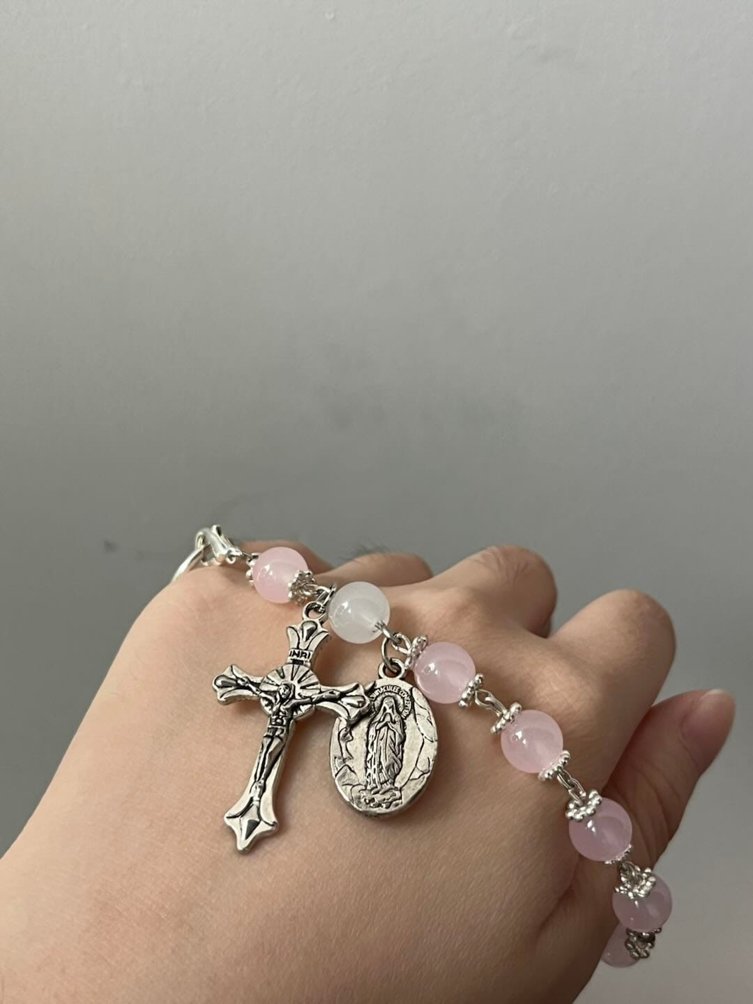 Customer photo review of SolaceBeads Pink Stone Rosary Bracelet with Marian Medal, Cross & Rose Details
