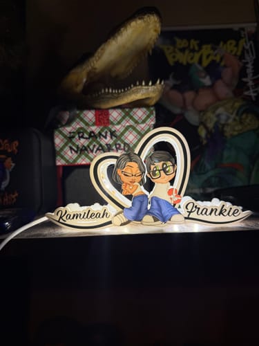 Customer's Personalized LED Light Box with names Kamileah and Frankie displayed on a shelf.