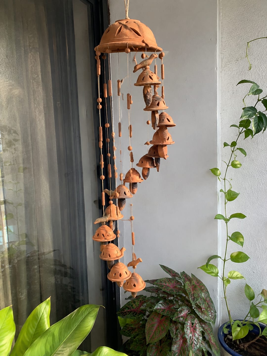Customer photo review of Terracotta Wind Chime — Handcrafted Clay Bell Wind Chime with Bird Motifs