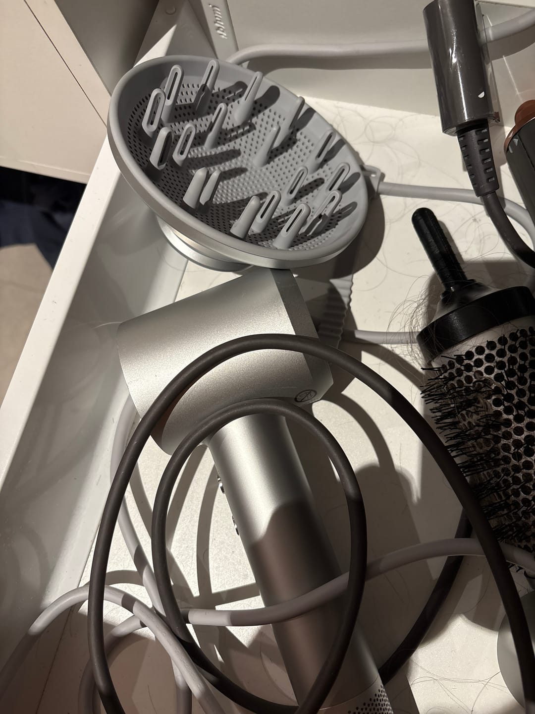 Customer photo review of Laifen Swift 4 High-Speed Hair Dryer with Oil-Infused Airflow, 3 Nozzles & Nourishing Pods