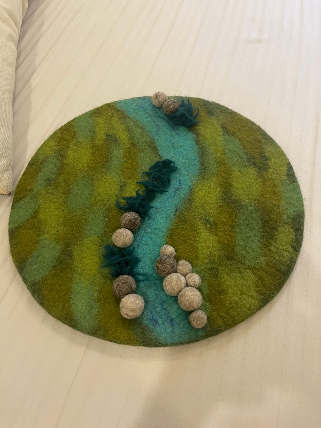 Customer photo review of River Round Play Mat Playscape
