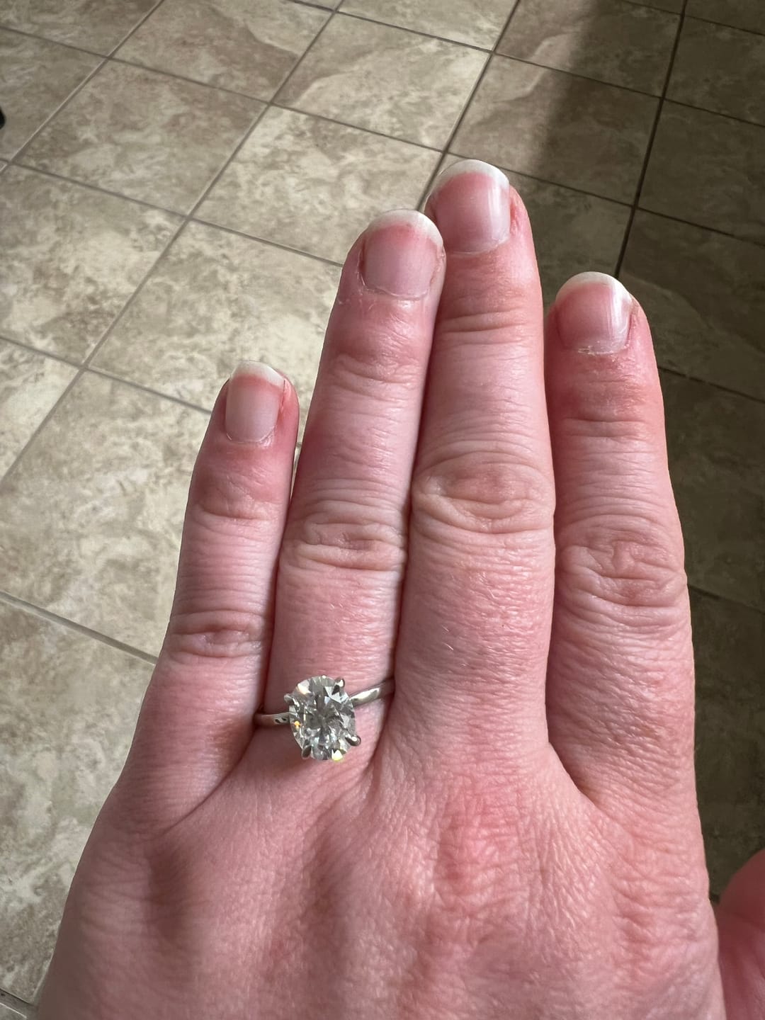 Customer photo review of Jade 2.5 Carat Oval Cut Solitaire Moissanite Diamond Ring in 10k White Gold
