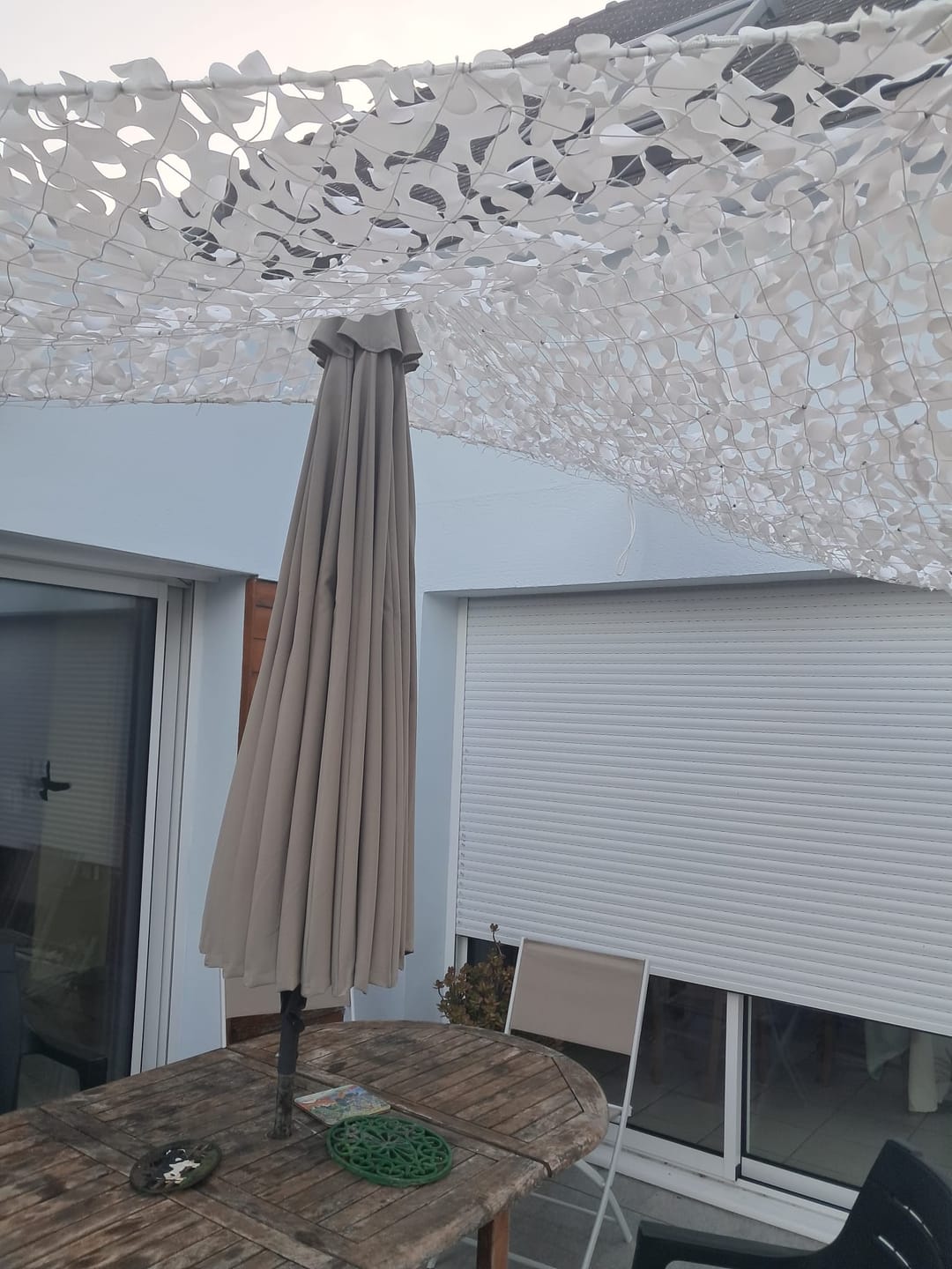Customer photo review of Filet de camouflage triangulaire blanc