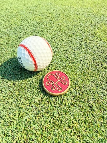 Customer photo review of 🔥 BLOODLINE Golf Ball Marker - Brass & Red Wine Leather