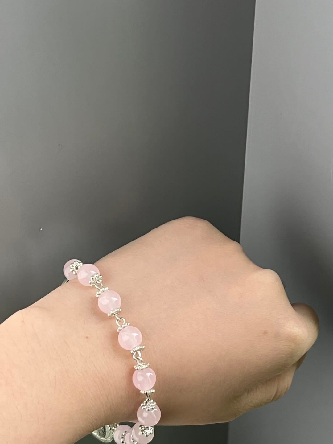 Customer photo review of SolaceBeads Pink Stone Rosary Bracelet with Marian Medal, Cross & Rose Details
