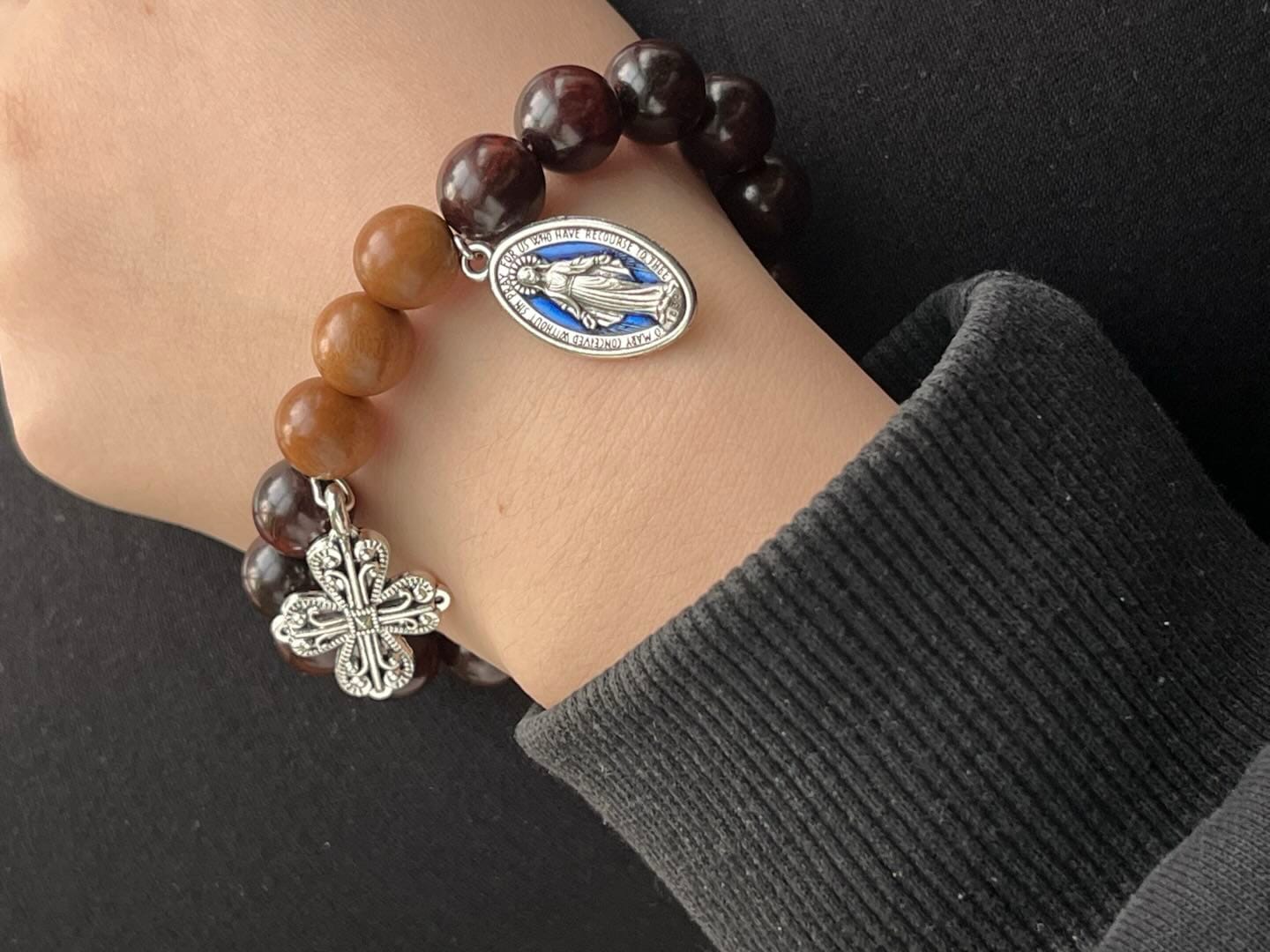 Customer photo review of Solacebeads Sandalwood & Peach Wood Bracelet With Miraculous Medal & Cross: Peace in Natural Grain