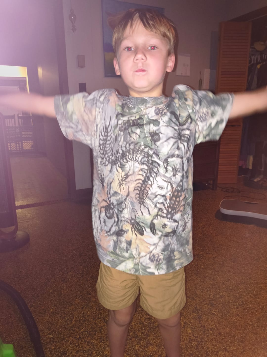 Customer photo review of Kids Camo Bug Oversized Tee