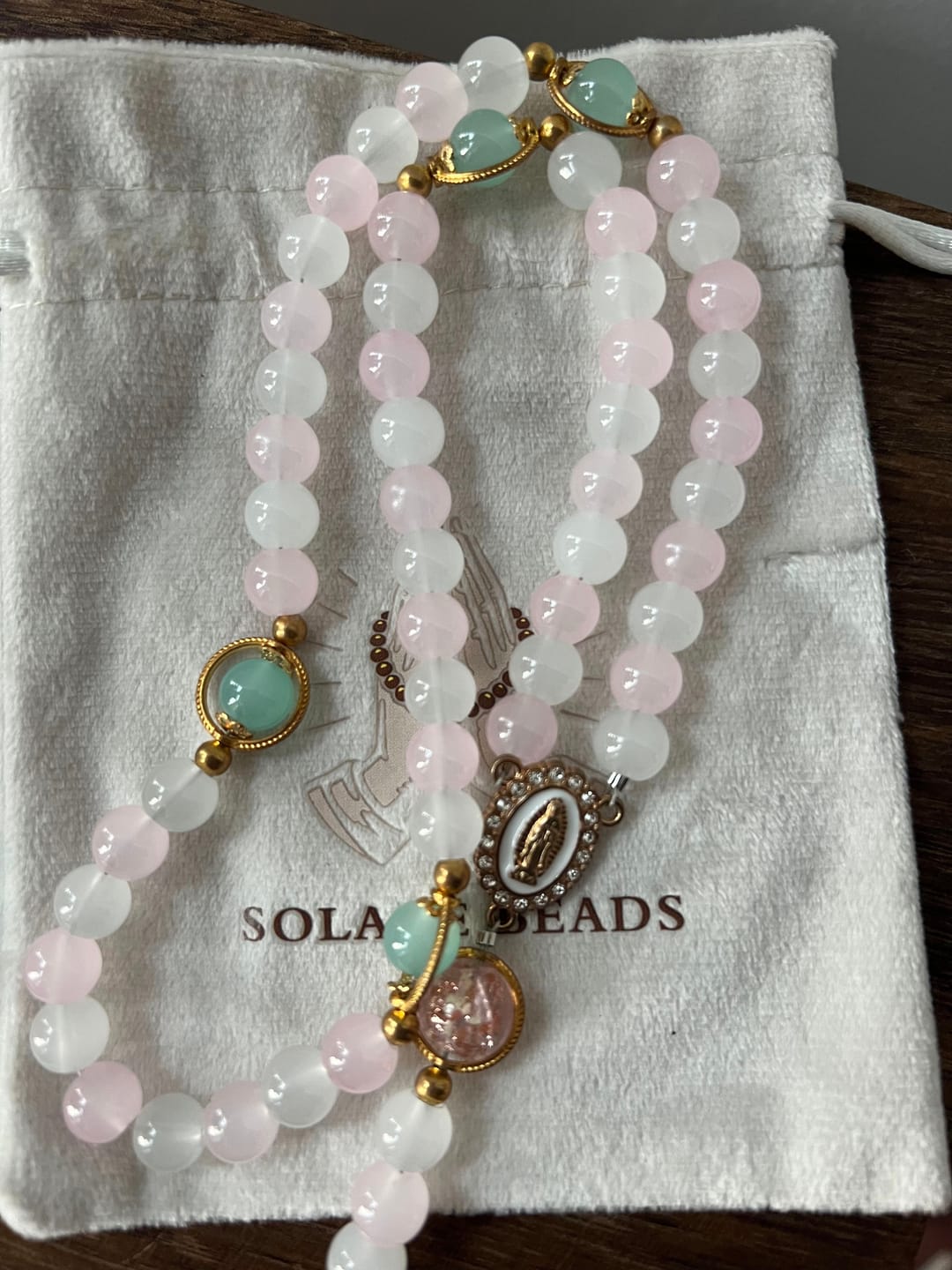 Customer photo review of SolaceBeads Artistic Pink & White Beaded Rosary: A Fusion of Colors & Sacred Symbols