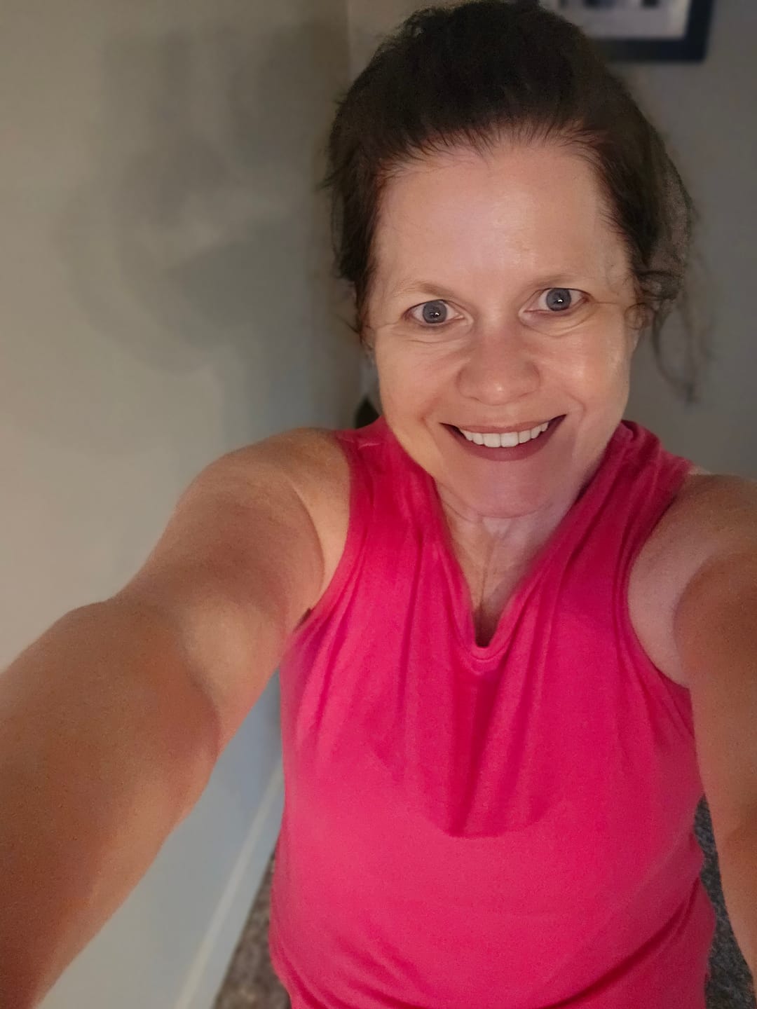 Customer photo review of Flowy Scoop Hem Muscle Tank