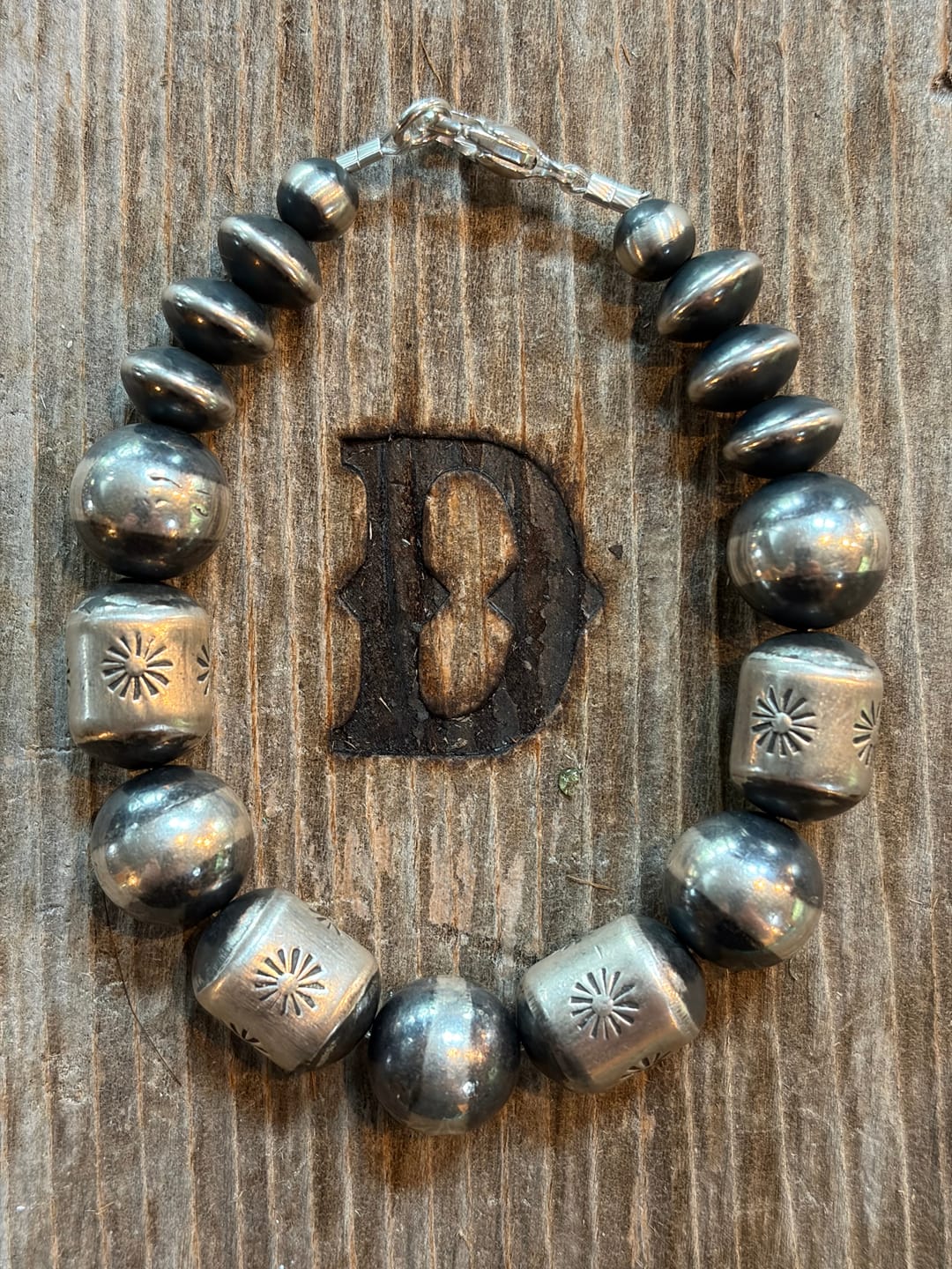 Customer photo review of Handmade Stamped Sterling Silver Barrel Beads, High Noon