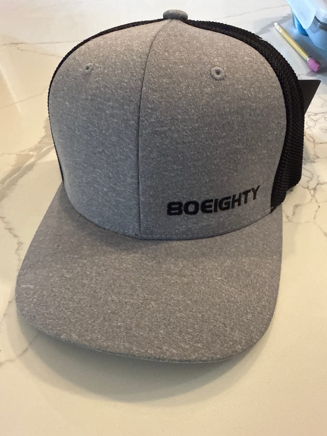 Customer photo review of 80Eighty® Melange Trucker Hat