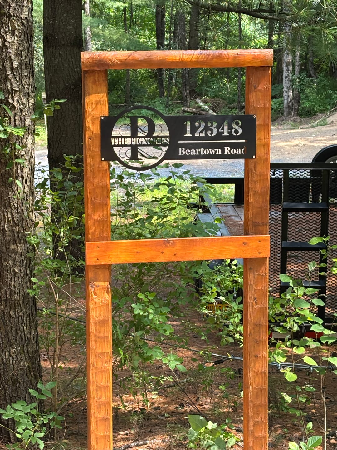 Customer photo review of Family Name Address Metal Sign