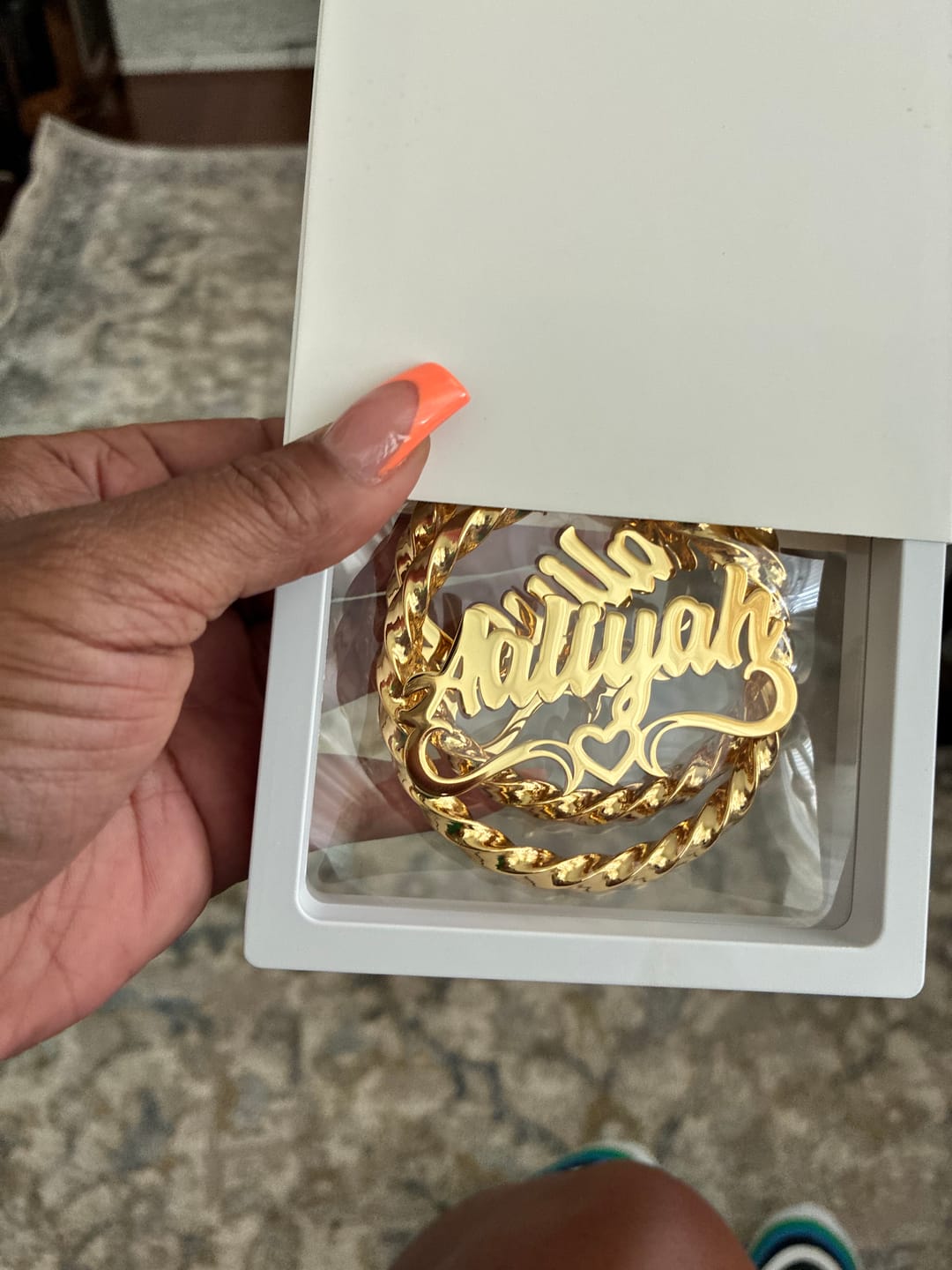 Customer photo review of Heart Twist Name Hoop Earrings
