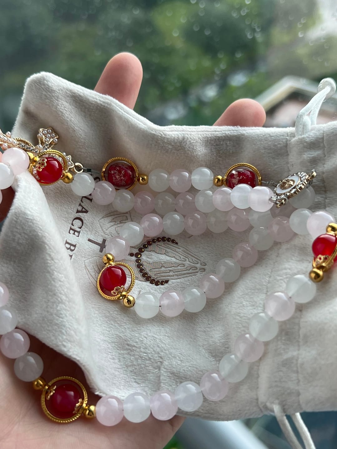 Customer photo review of SolaceBeads Artistic Pink & White Beaded Rosary: A Fusion of Colors & Sacred Symbols