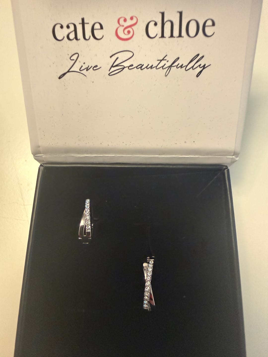 Customer photo review of Amaya 18k White Gold Plated 16mm Twisted Hoop Earrings with Swarovski Crystals