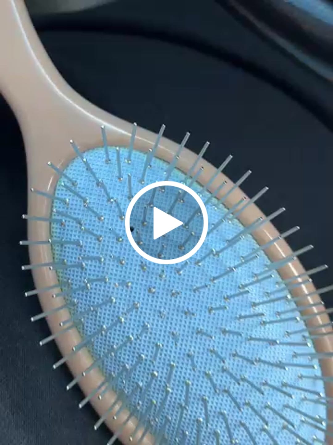 Customer video review of The Detangling Brush