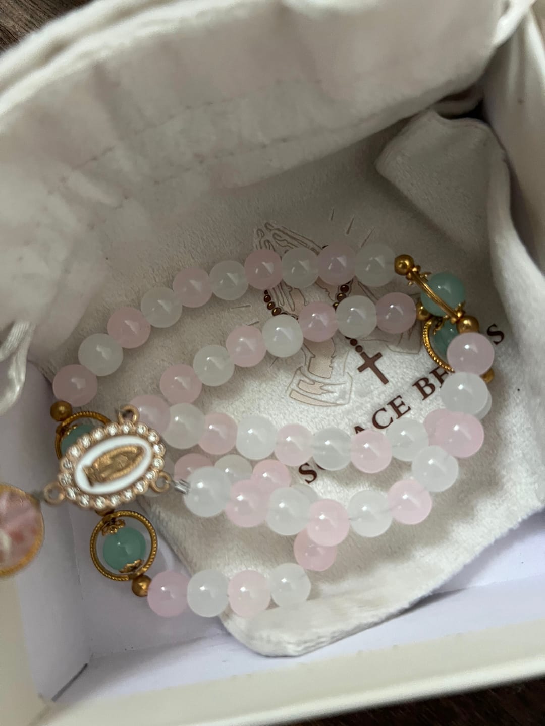 Customer photo review of SolaceBeads Artistic Pink & White Beaded Rosary: A Fusion of Colors & Sacred Symbols