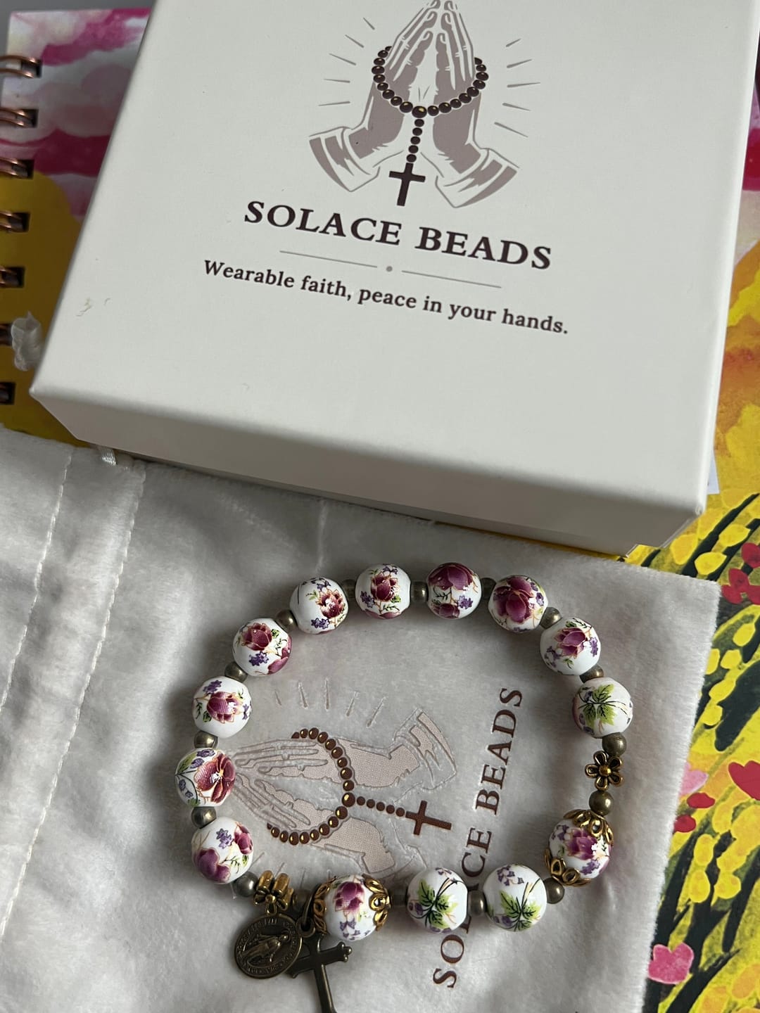 Customer photo review of SolaceBeads Peacock Blue & Champagne Crystal Rosary: A Prismatic Glow of Sacred Light