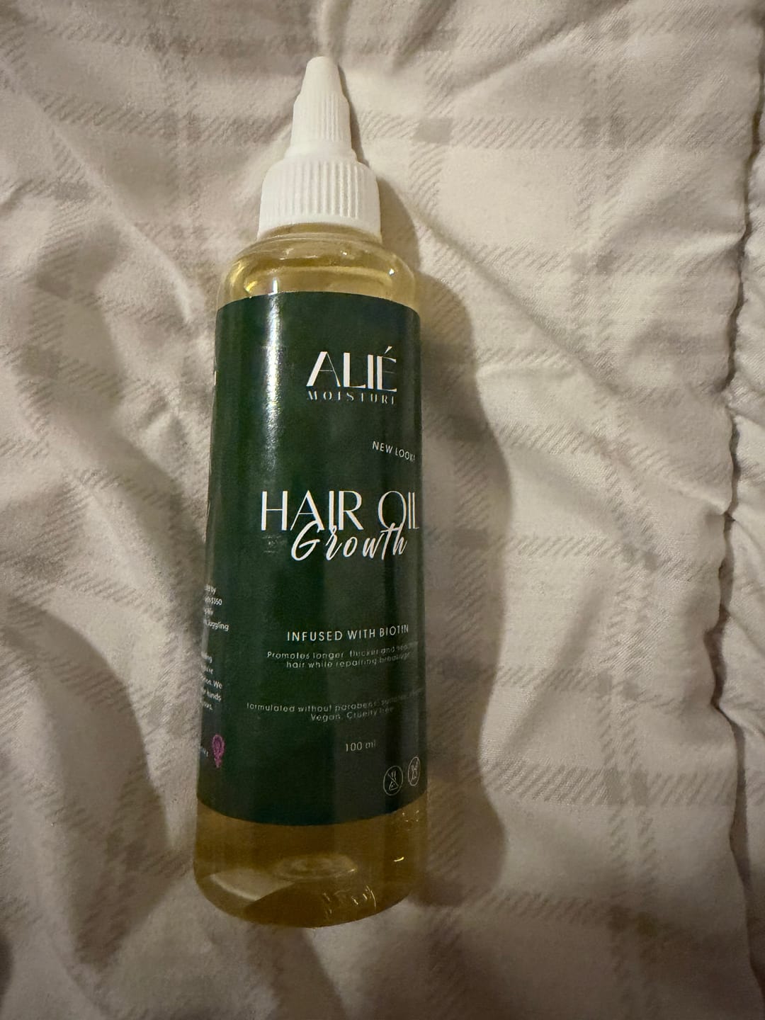 Customer photo review of ALIÉ MOISTURE'S HAIR OIL