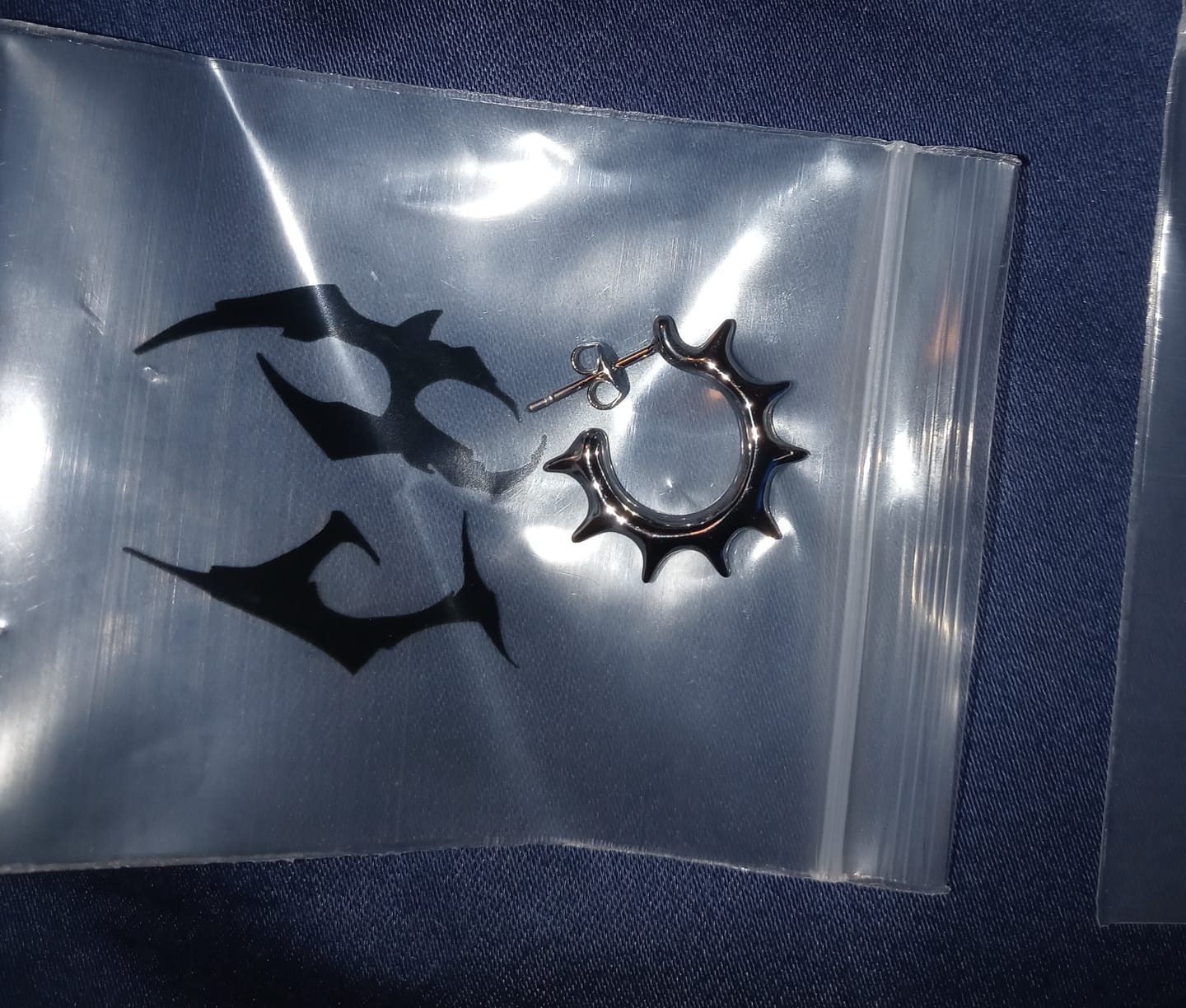 Customer photo review of SPIKED OPEN HOOP EARRING