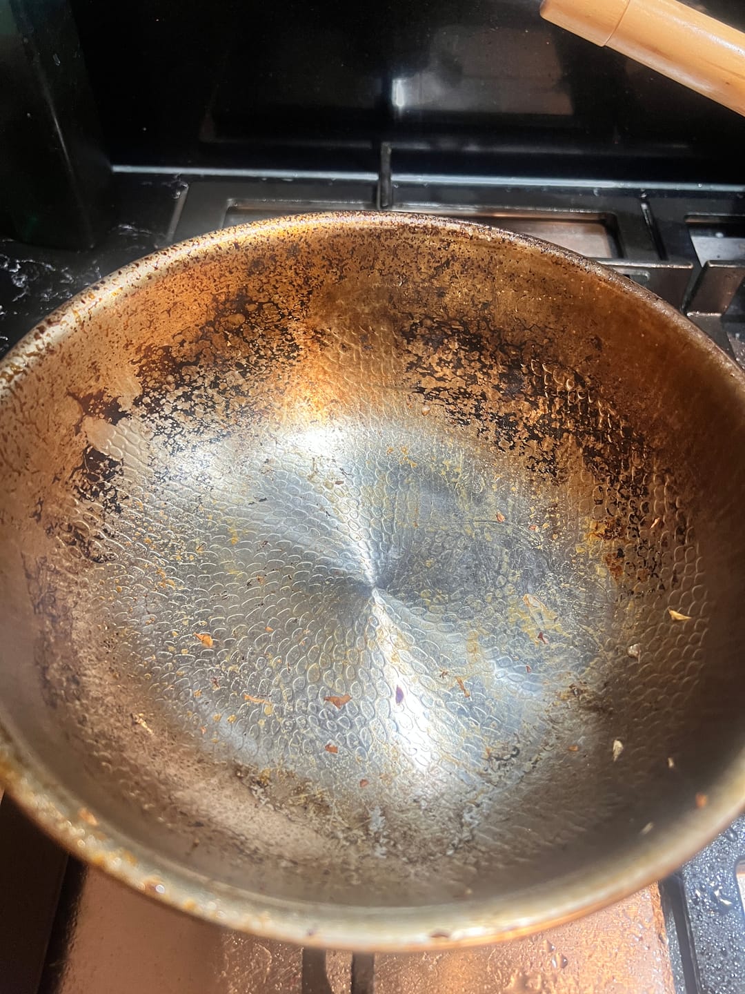 Customer photo review of Hand-Hammered Titanium Wok Pan with Flat Base