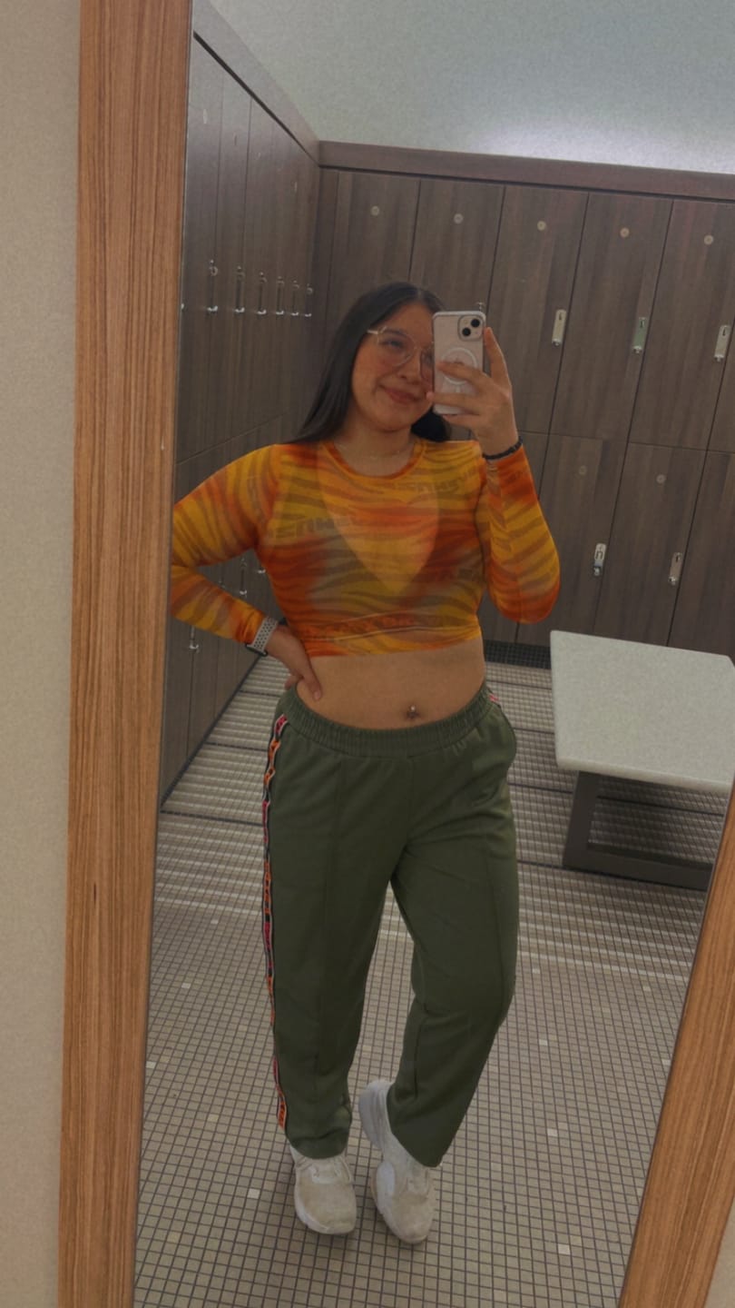 Customer photo review of Wildbeat Long Sleeve Mesh Crop Top