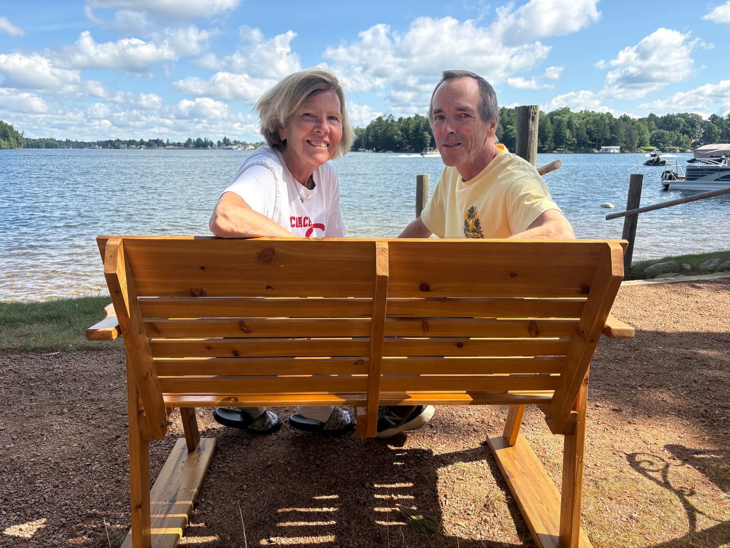 Customer photo review of Homrest Wooden Patio Glider Bench with Cup Holders Heavy Duty 900lbs
