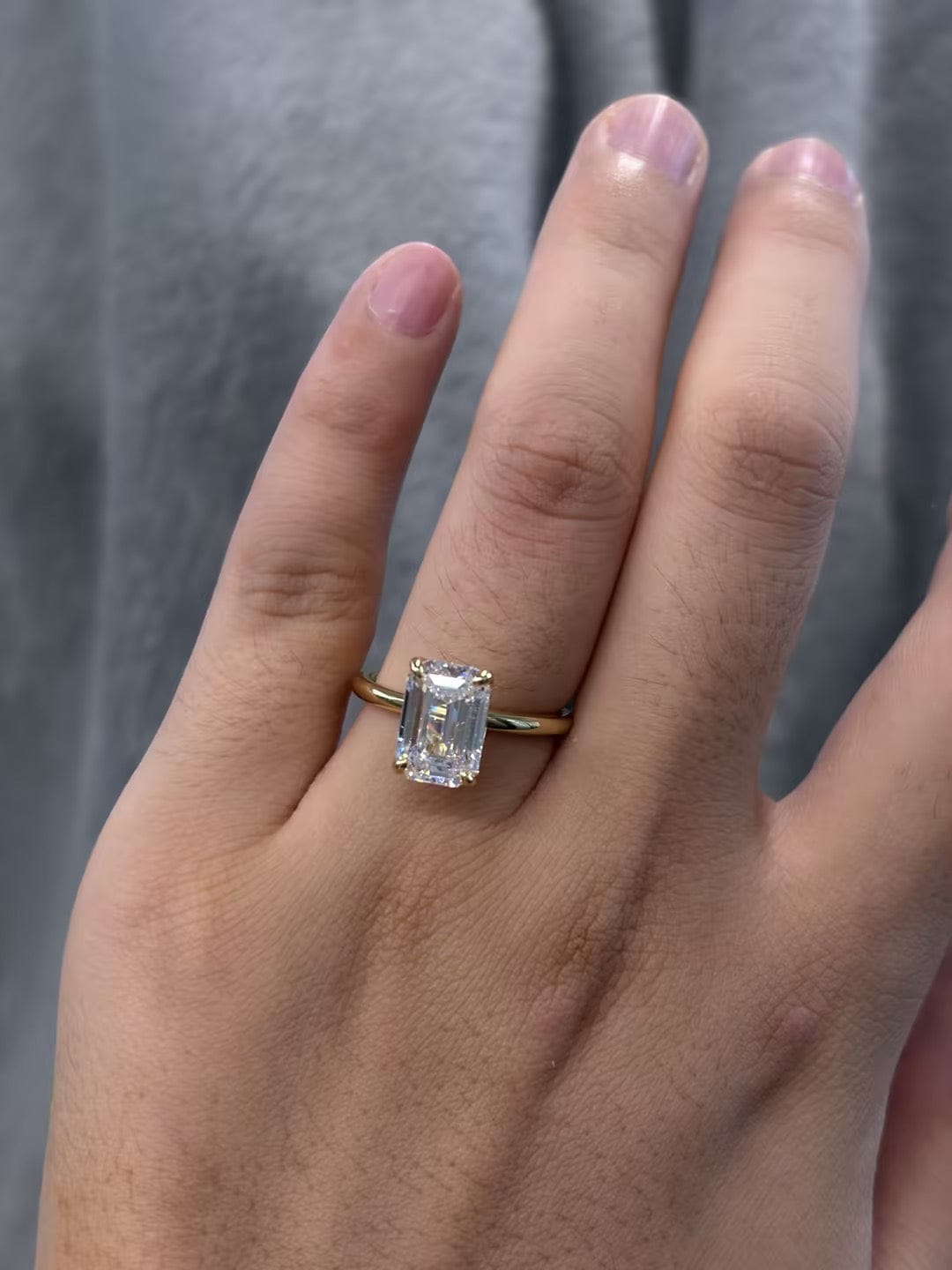 Customer photo review of S925 3.5Ct Emerald Cut Solitaire 18K Yellow Gold Engagement Ring in Sterling Silver