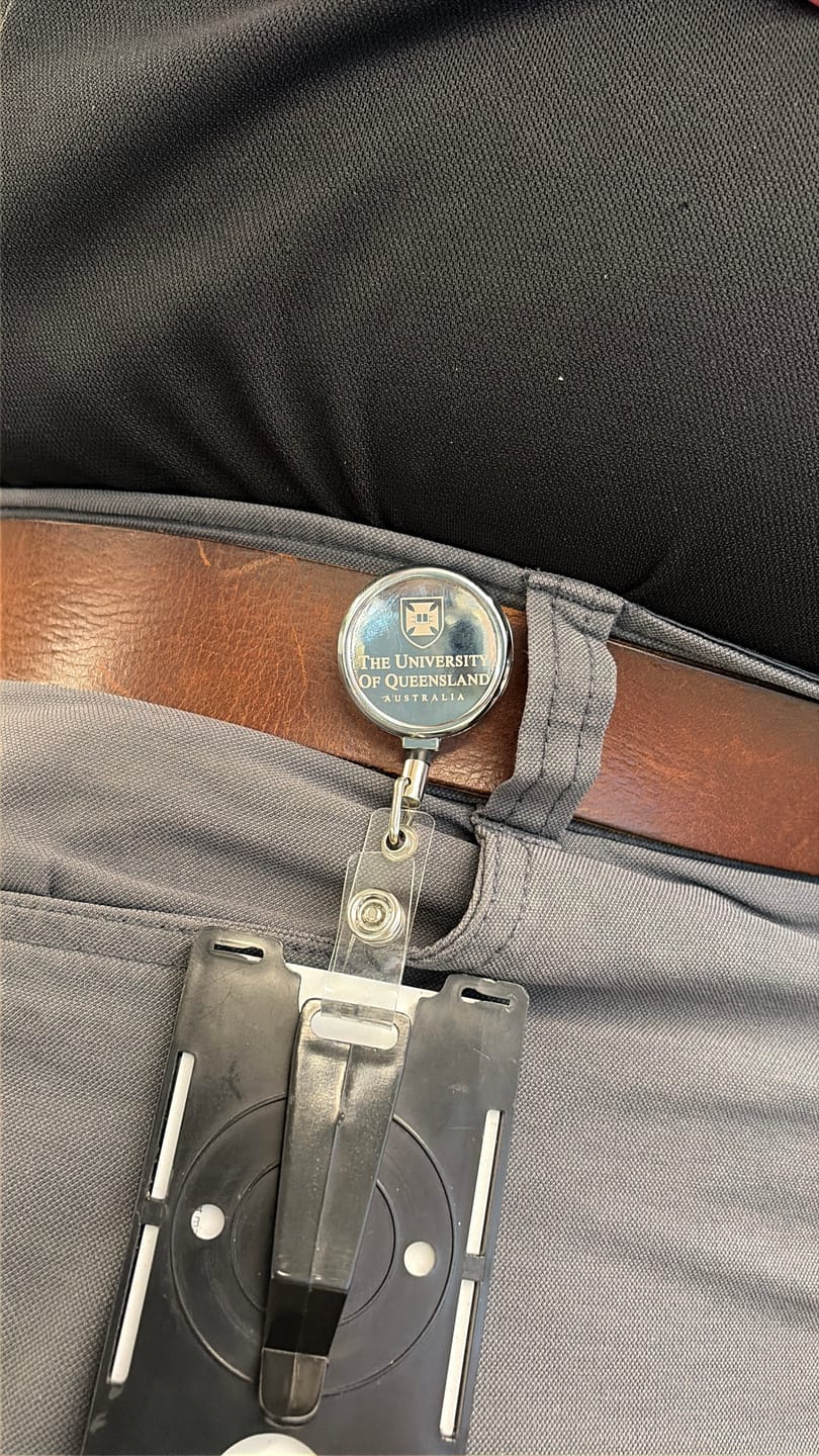 Customer photo review of UQ Shield Metal Zip Pull Badge Holder