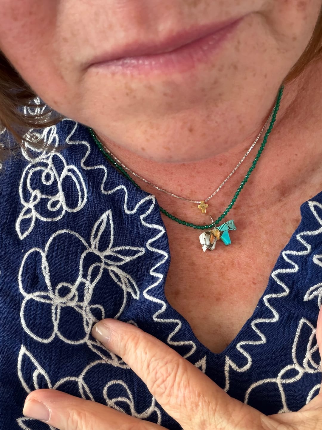 Customer photo review of Hand Carved Spice Horse Pendant