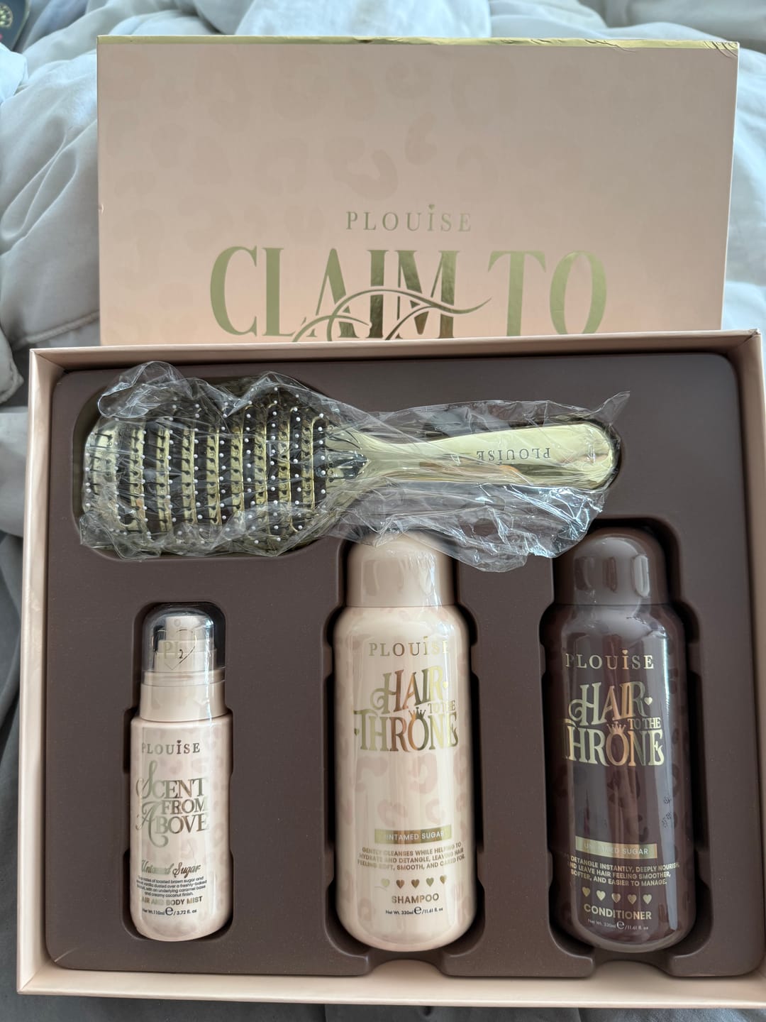 Customer photo review of Cheetah Claim To Tame Hair Care Set