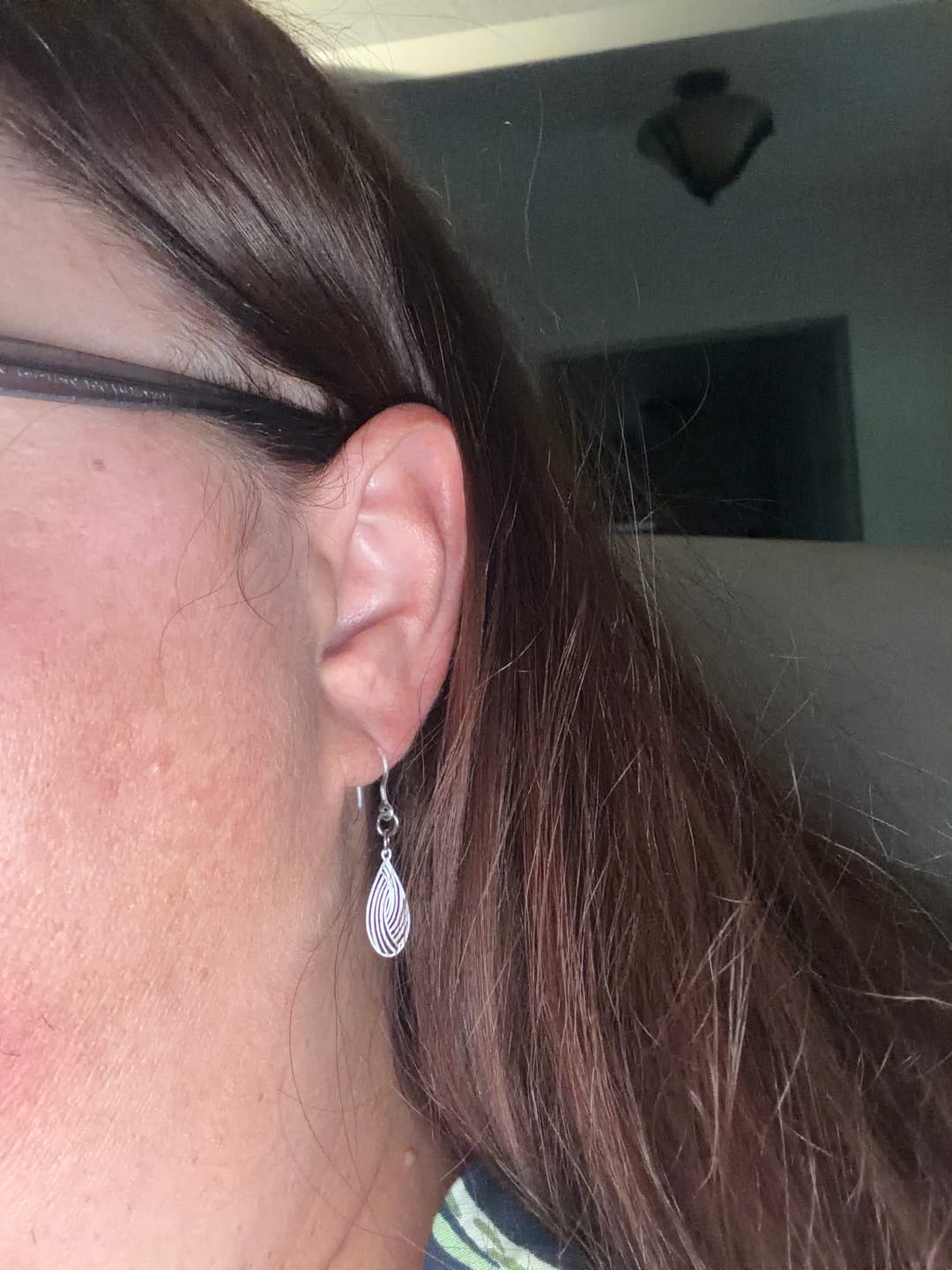 Customer photo review of Petite Teardrop Swirl Dangles Hypoallergenic Earrings for Sensitive Ears with Plastic Posts