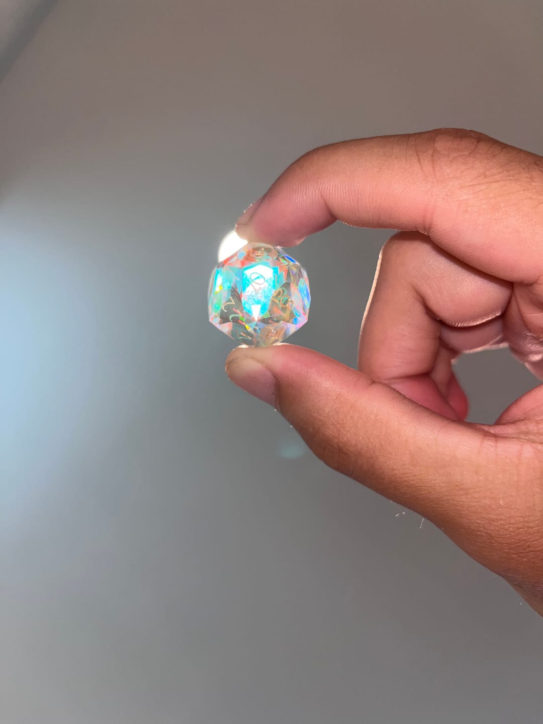 Customer photo review of URWizards D&D Multi-faceted Prism Glass Engraved Dice Set