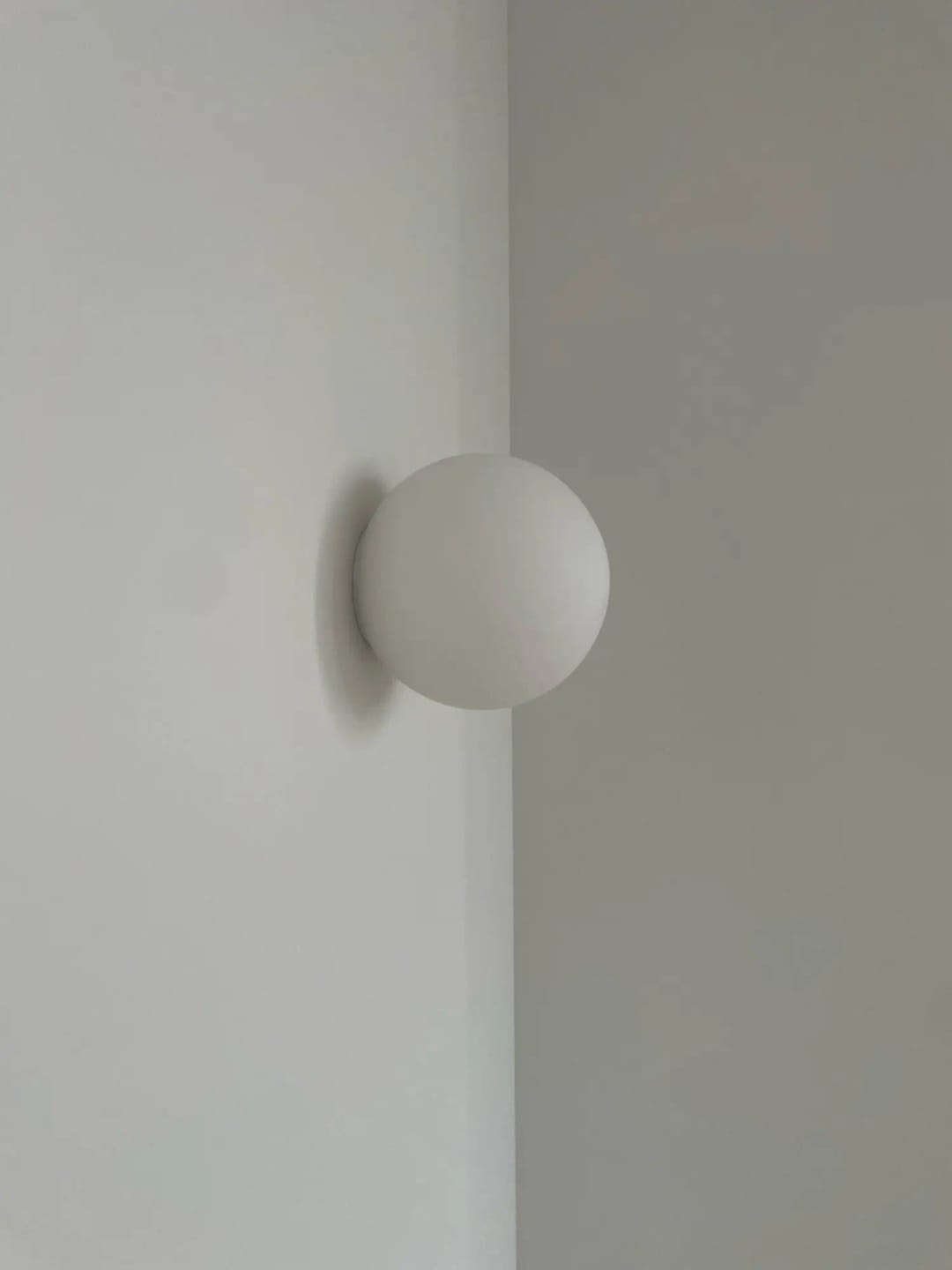 Customer photo review of Round Frosted Glass Wall Light, Single-LED Globe Fixture, Metal Base