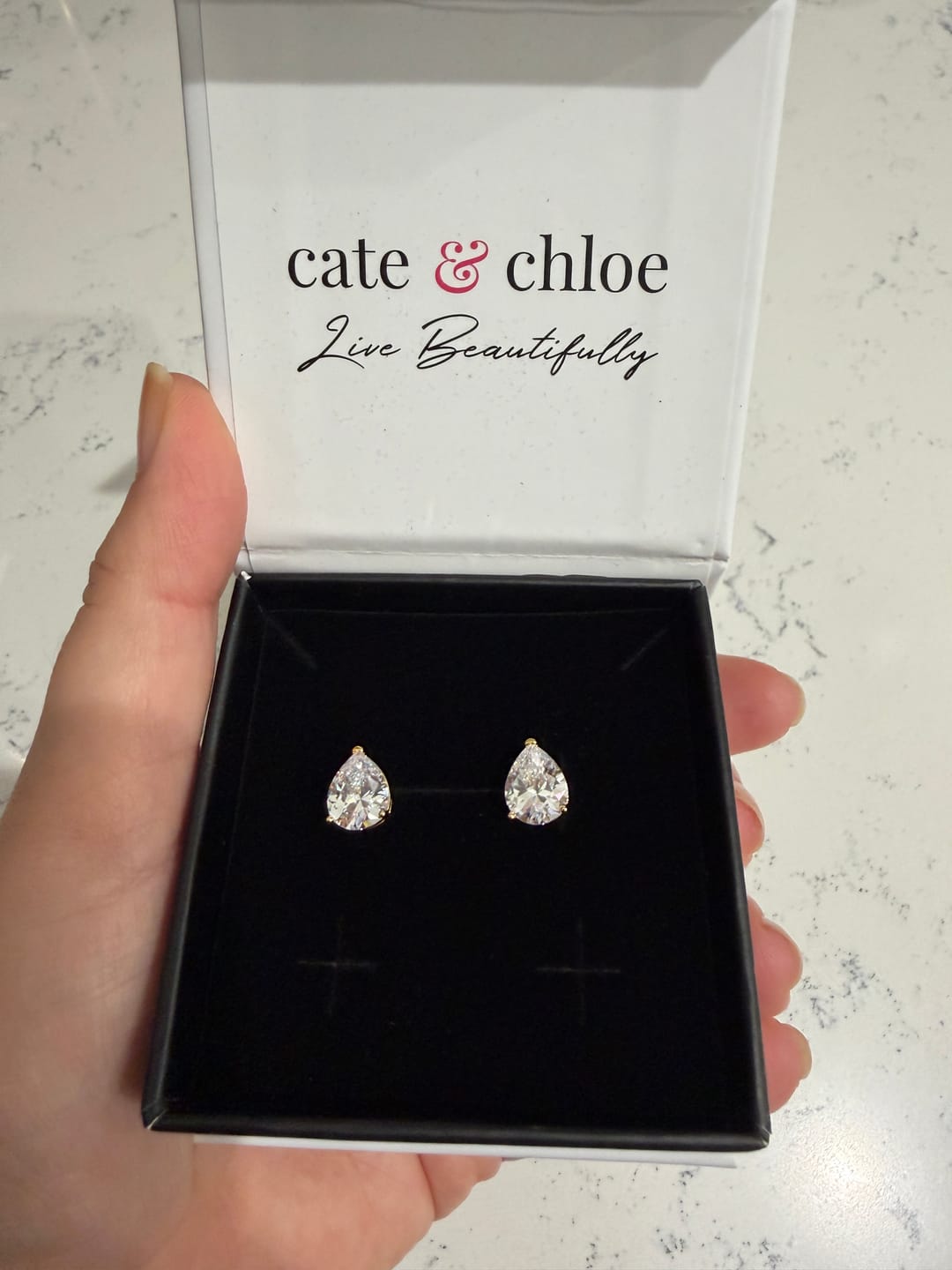 Customer photo review of Mia 18k White Gold Plated Sterling Silver Stud Earrings with Simulated Diamond Crystals