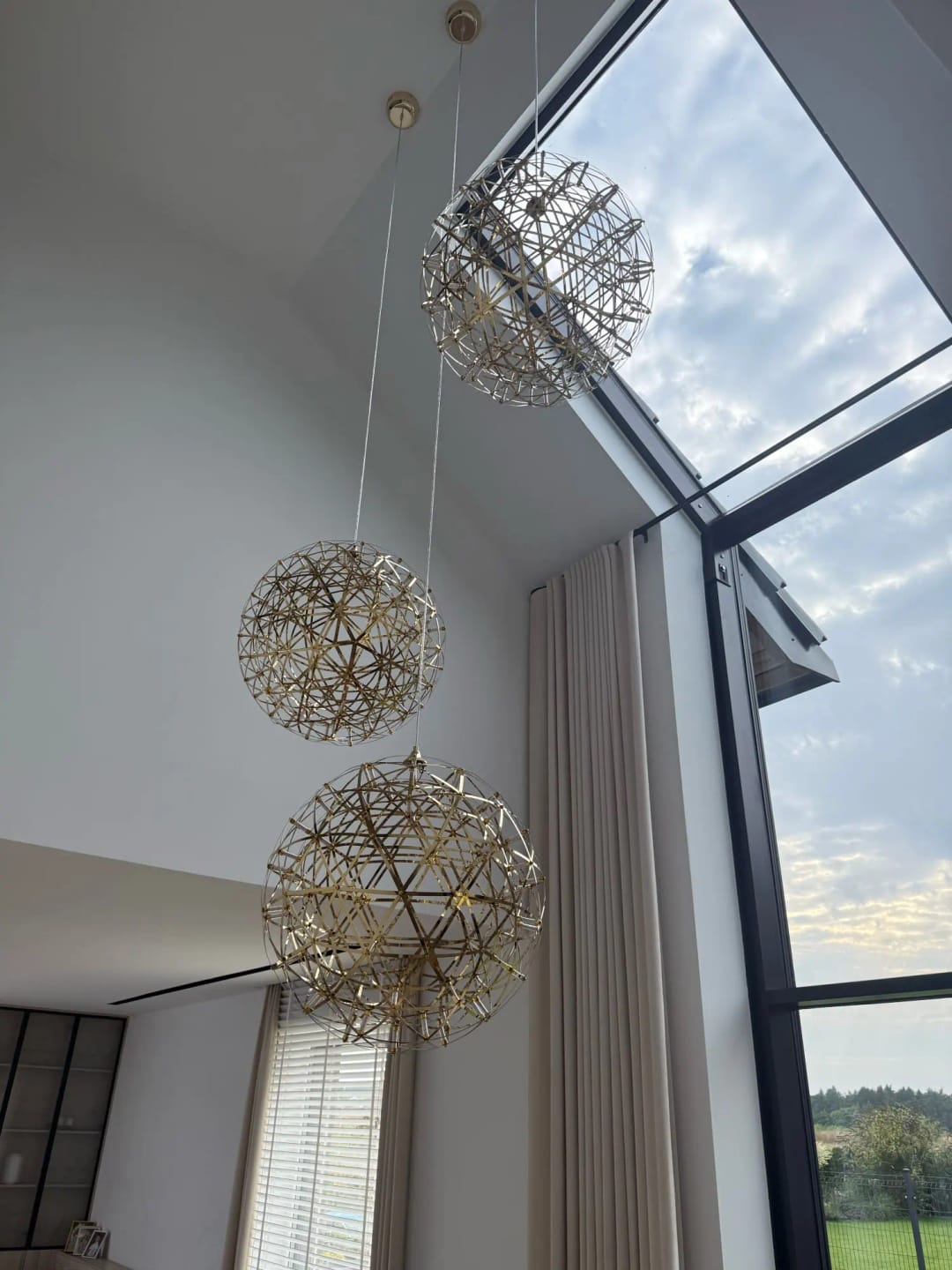 Customer photo review of Spark Ball Pendant Light, Stainless Steel Sphere, Warm White LED