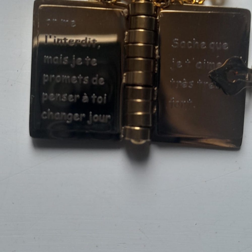 Customer photo review of Book Necklace - Personalized Opening Book Pendant Necklace
