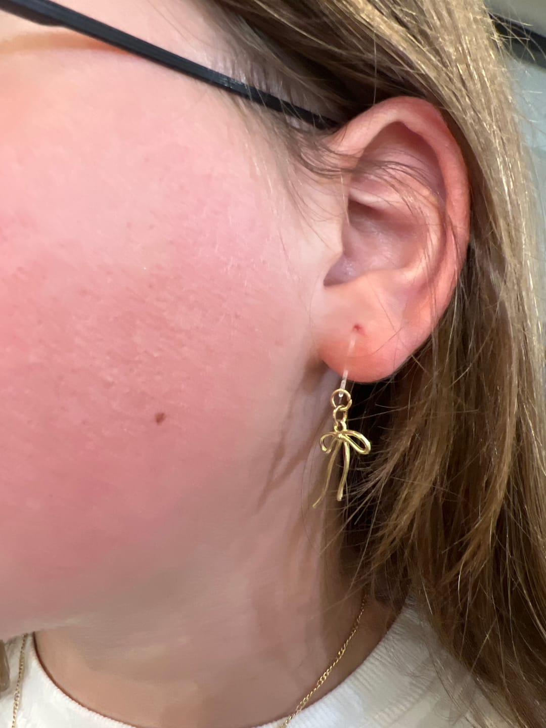 Customer photo review of Bow Dangles Hypoallergenic Earrings for Sensitive Ears with Plastic Posts