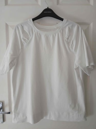 Customer's Gutermann Maraflex Elastic Stretch Thread used to sew a simple white jersey knit top.