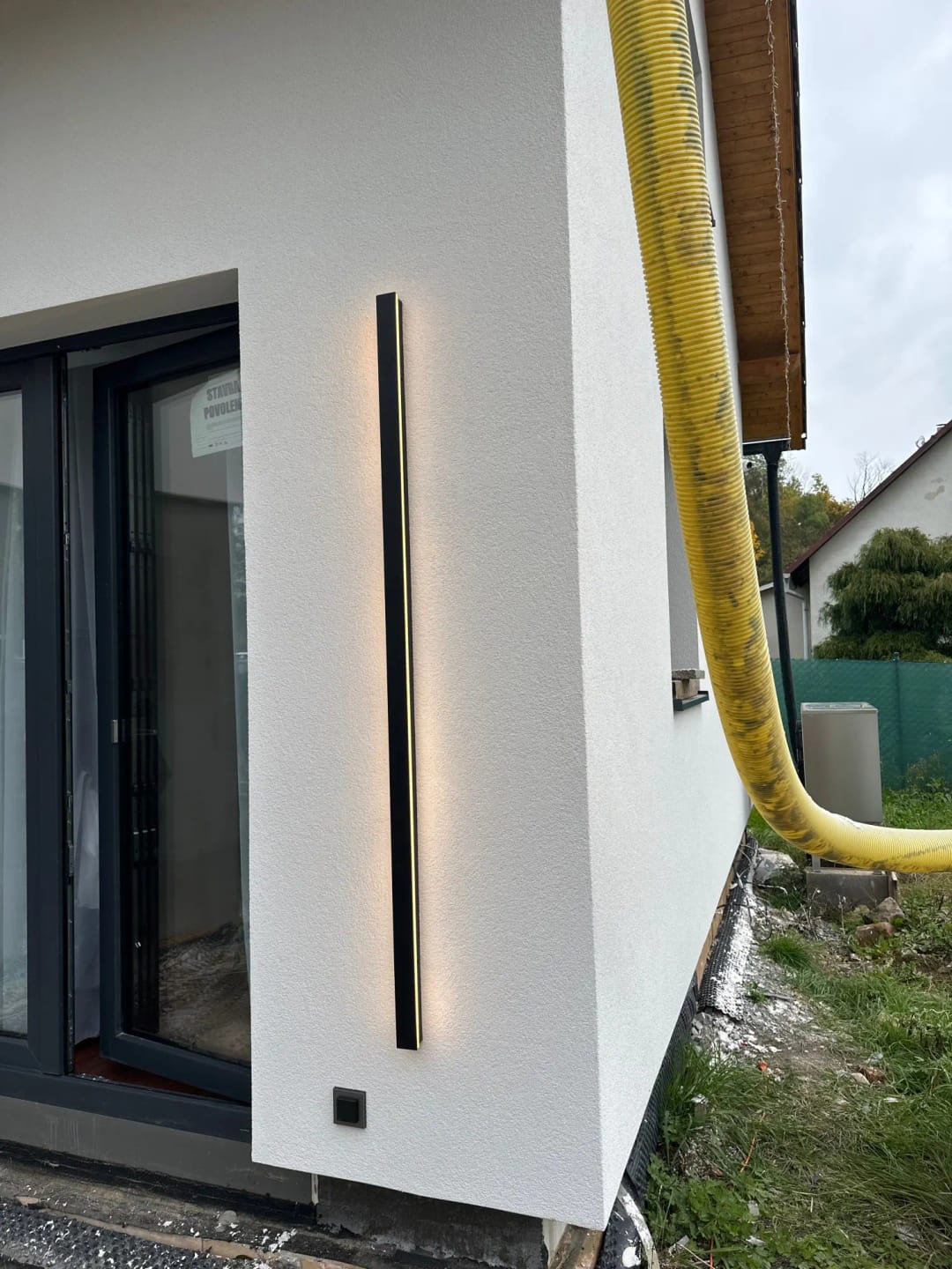 Customer photo review of Raymo Outdoor Wall Light With Linear LED Strip, Black IP65