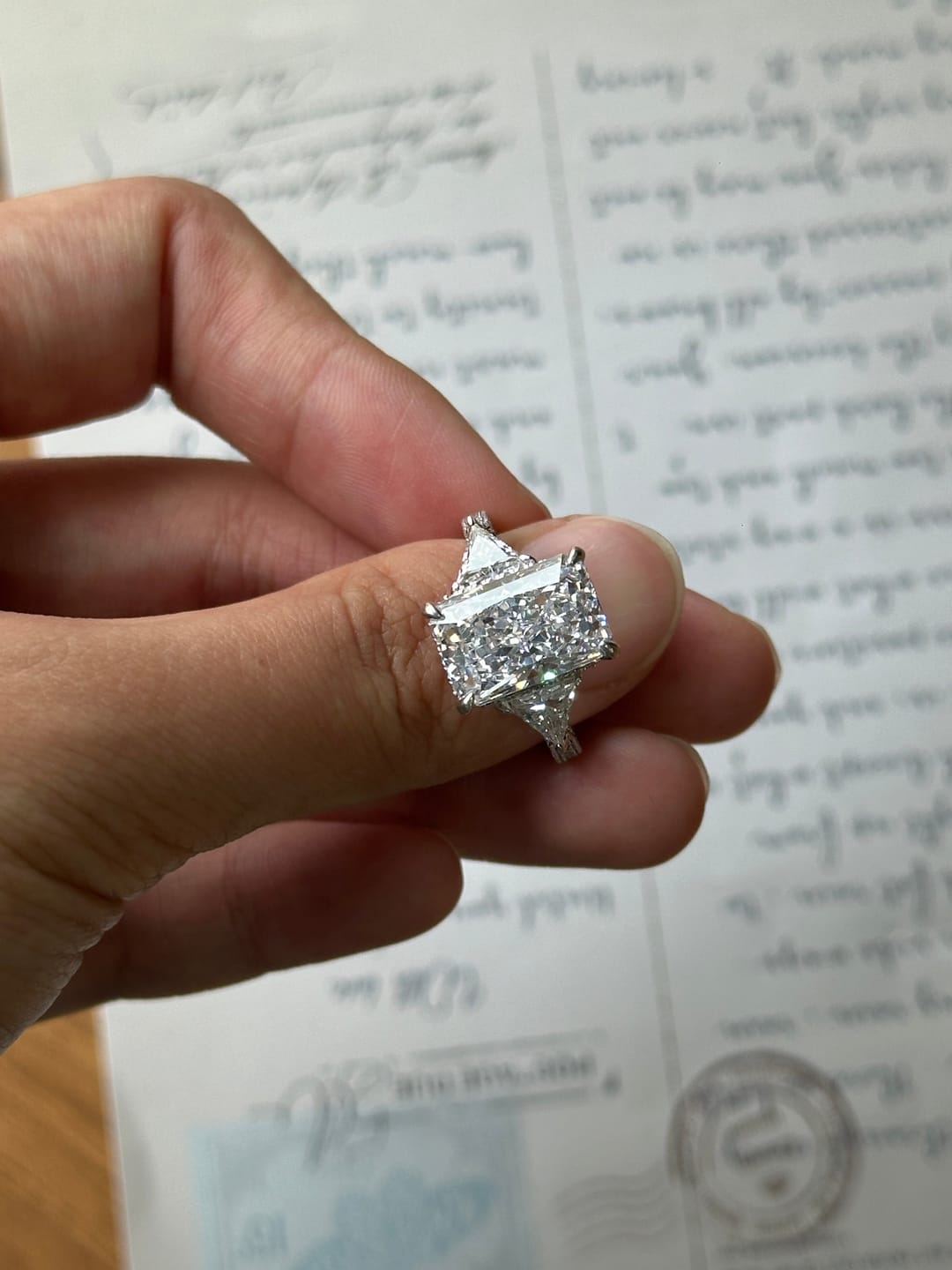 Customer photo review of S925 5.0 Carat Radiant Cut White/Pink Three Stone Engagement Ring With Hidden Halo For Everyday Wear