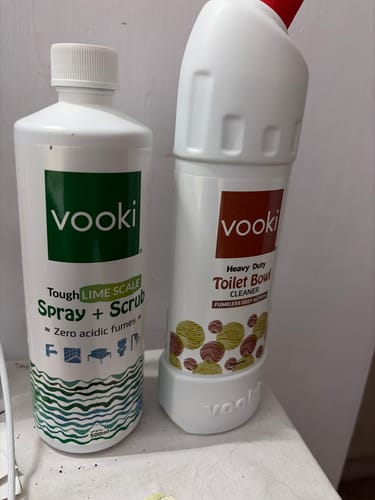 Customer's vooki Tough Limescale Spray and Heavy Duty Toilet Bowl Cleaner bottles standing side by side.
