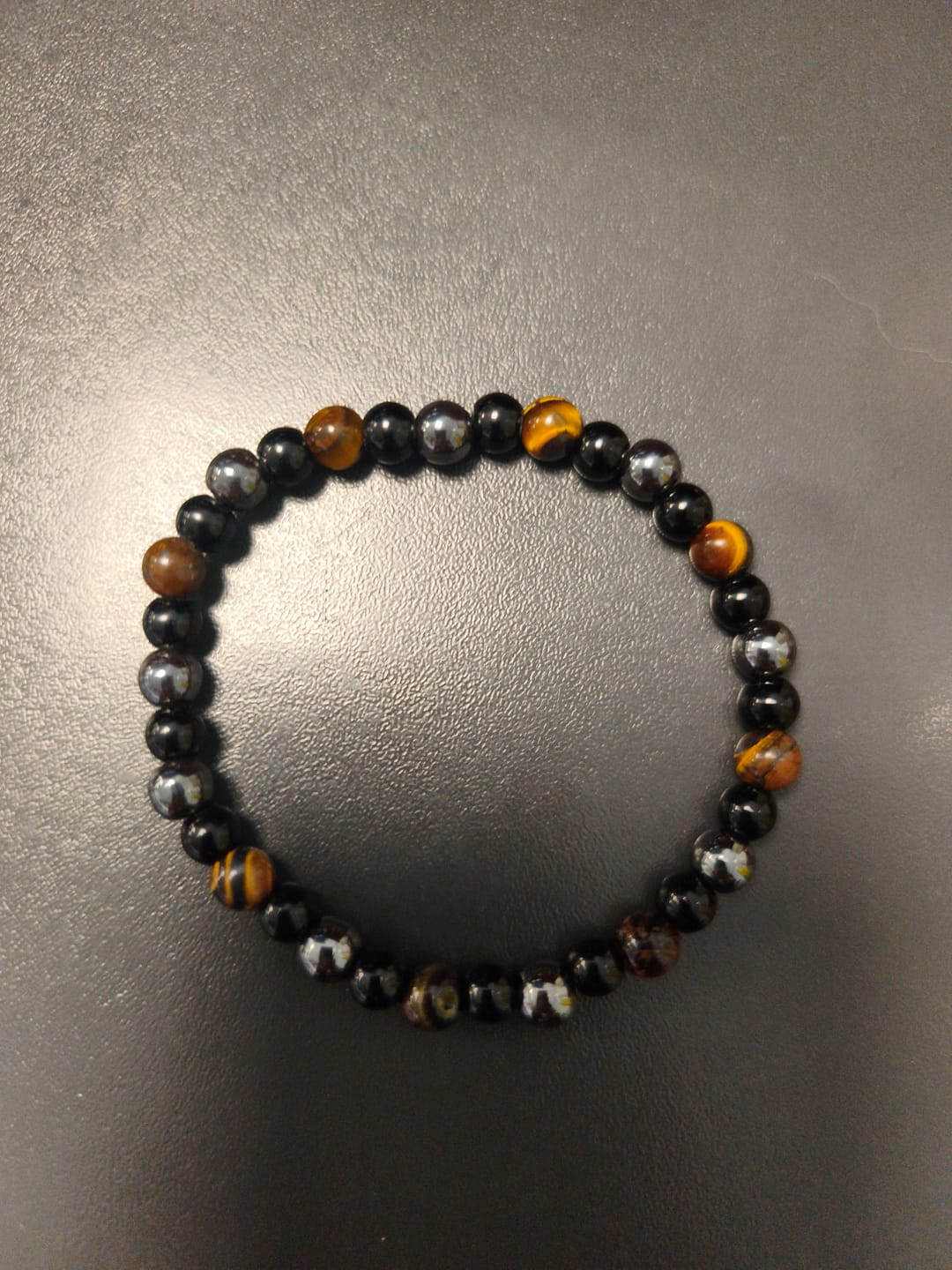 Customer photo review of Bracelet "Triple Protection" en Hématite, Oeil de Tigre et Obsidienne