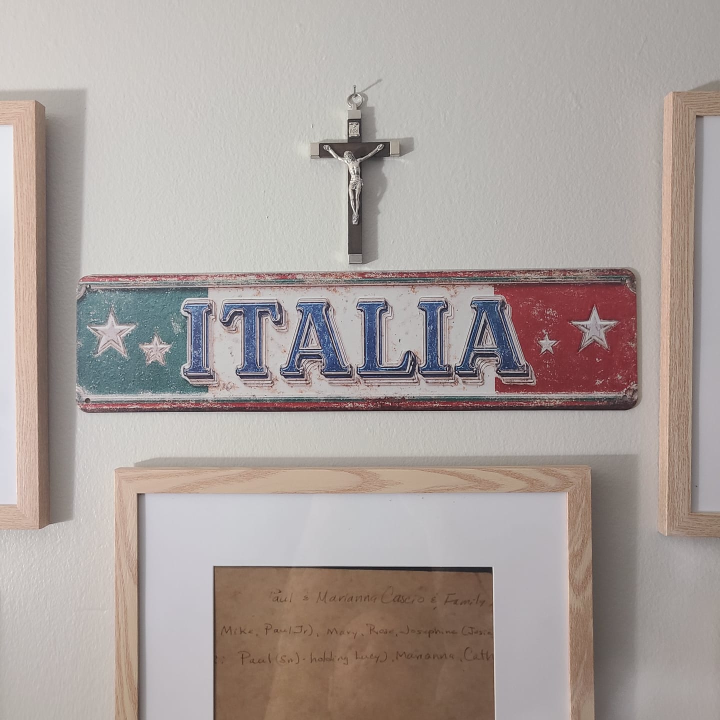 Customer photo review of Handcrafted Italian Wooden Crucifix – 4.5" Dark Wood and Metal Inlays
