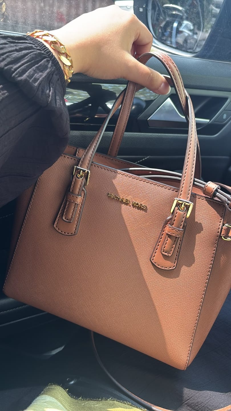 Customer photo review of Michael Kors Women's Voyager Extra-Small Saffiano Leather Convertible Crossbody Bag Luggage/Gold