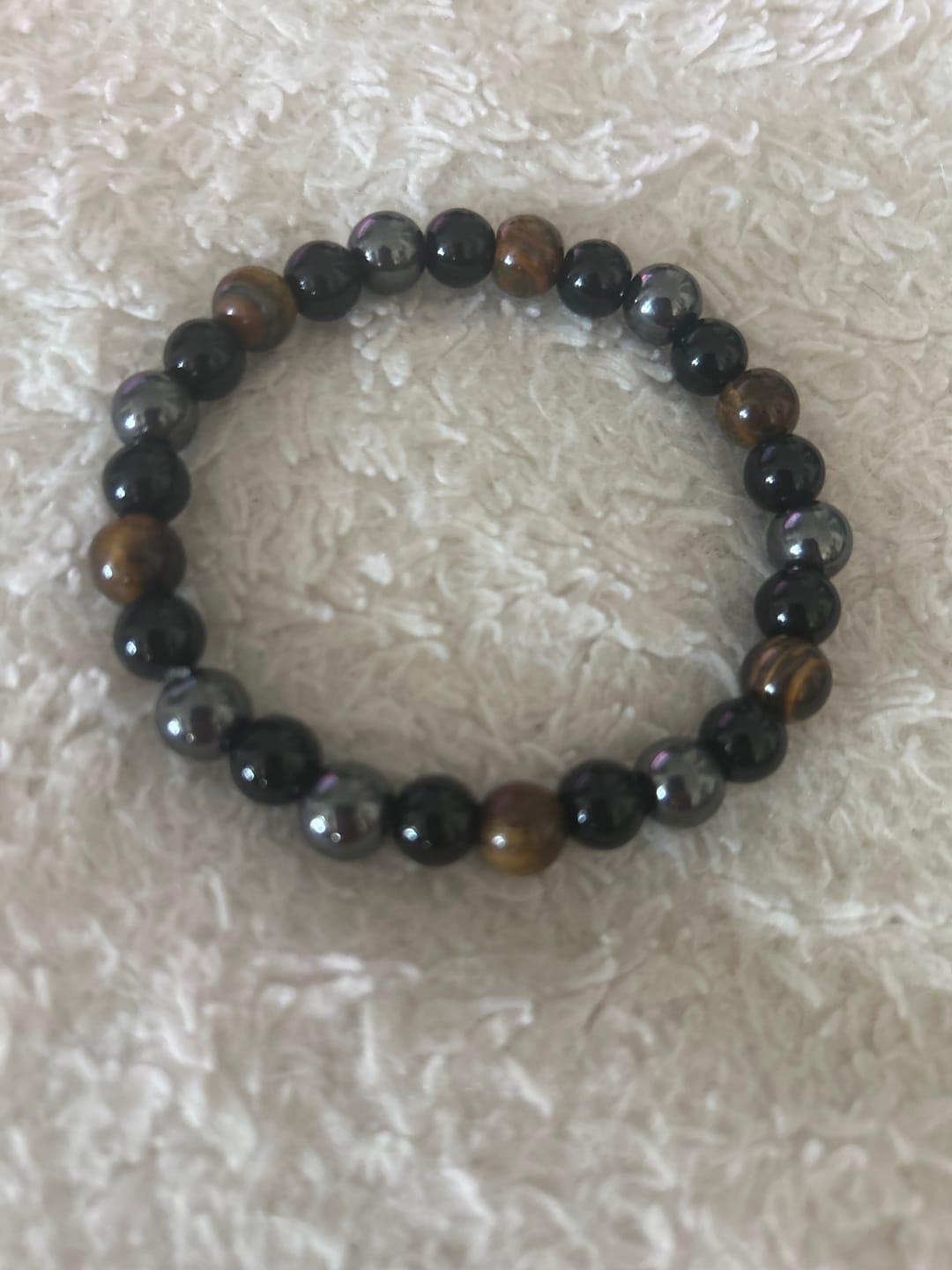 Customer photo review of Bracelet "Triple Protection" en Hématite, Oeil de Tigre et Obsidienne