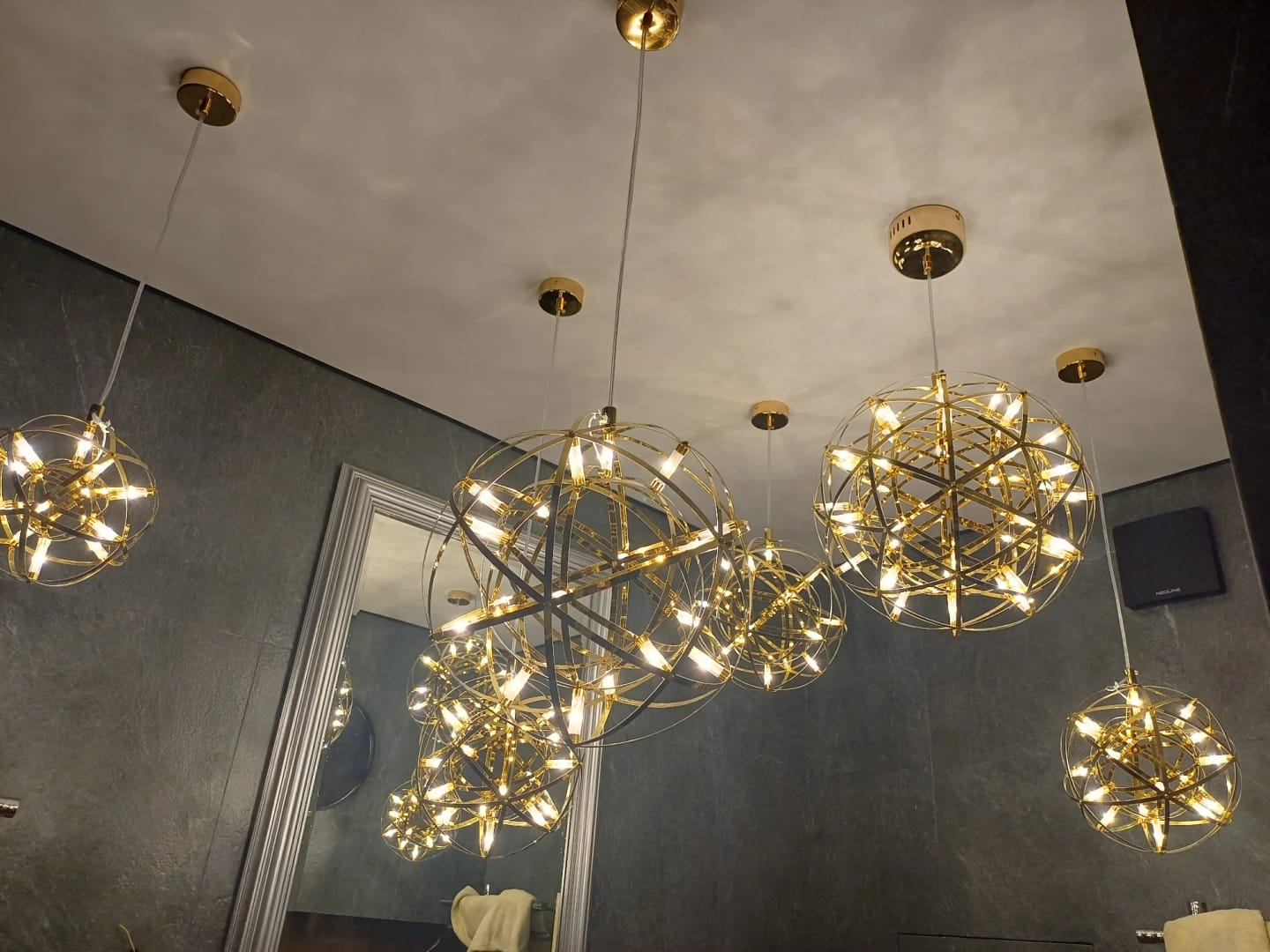 Customer photo review of Spark Ball Pendant Light, Stainless Steel Sphere, Warm White LED