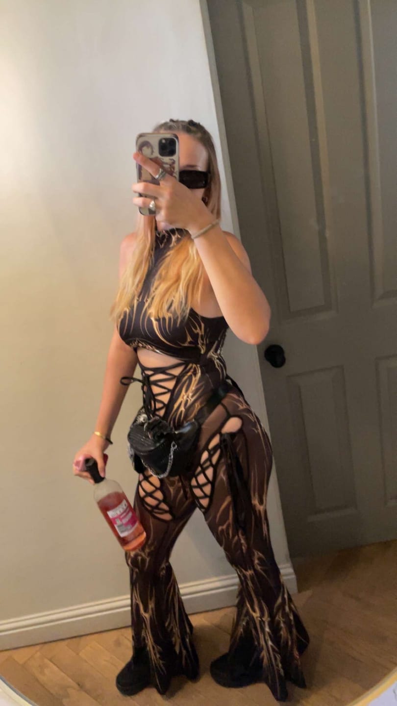 Customer photo review of Black Gold Ribbon Cut Out Jumpsuit