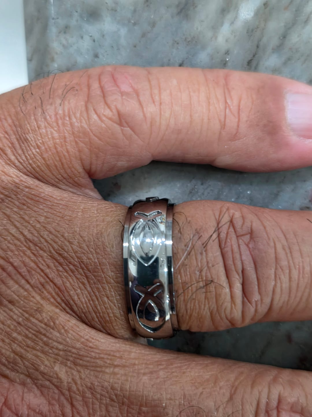 Customer photo review of Jesus Fish Ring  - Titanium 8mm